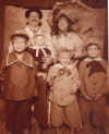 Grandkids and their parents in their Sunday best - 1910!